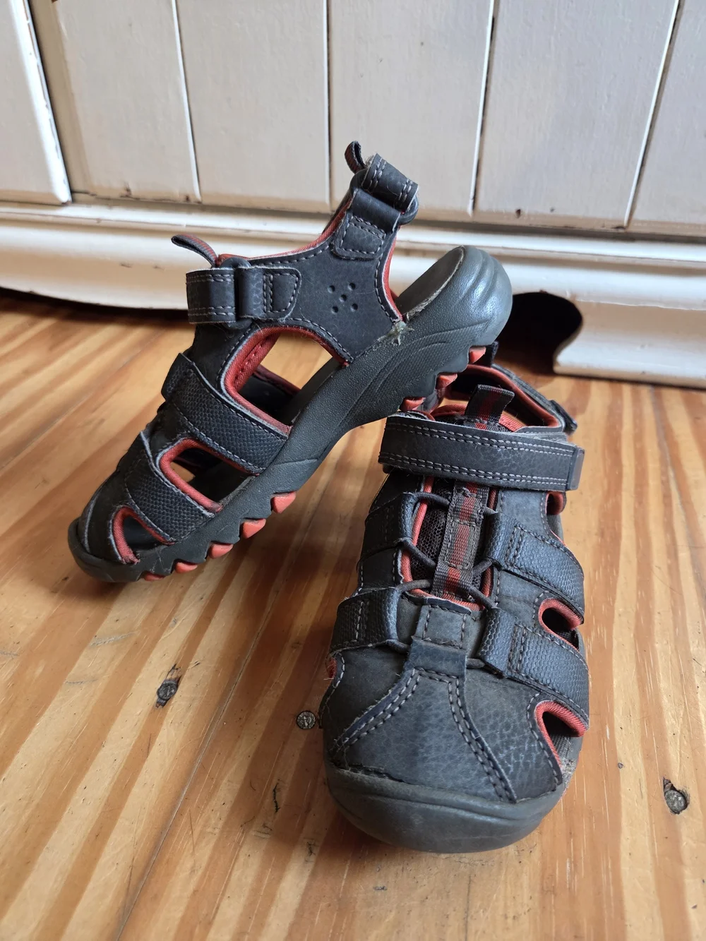 Kids Closed-Toe Sandals in Black with Orange Accents